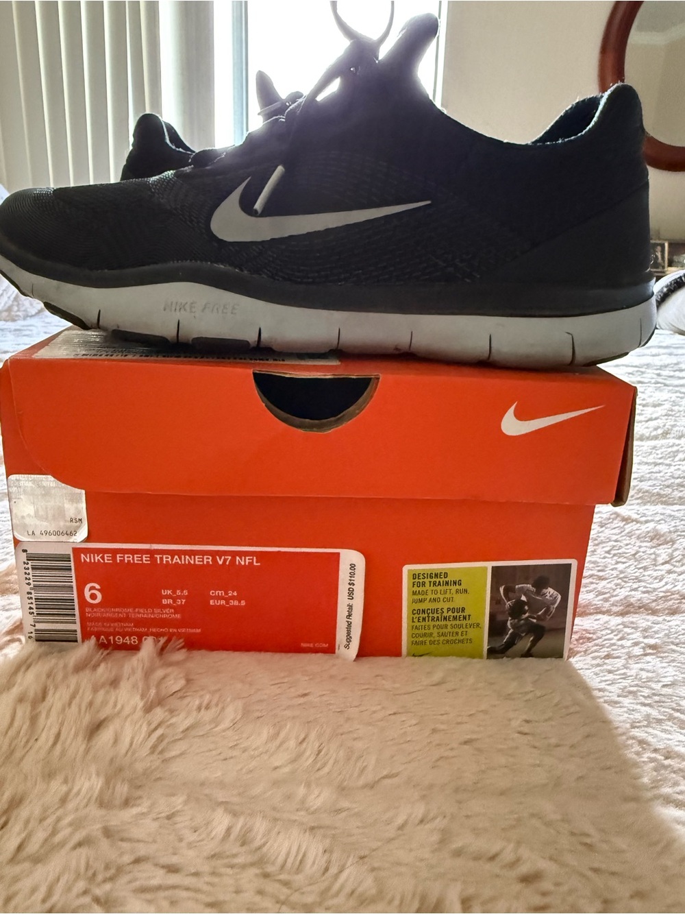 Nike Men’s Black and White Free Trainer V7 Athletic Shoe